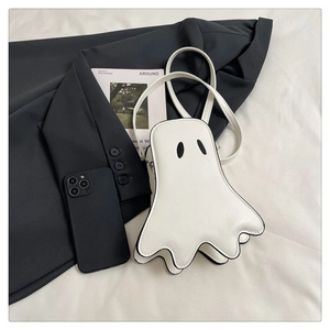 Detailed view of white ghost-shaped PU leather crossbody bag with black eye embroidery