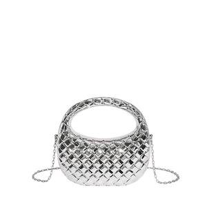 Metallic silver woven top handle handbag with a crescent silhouette and chain strap