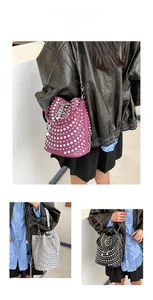 Detailed view of studded bucket bags in purple, grey, and black with pearl drawstring chains