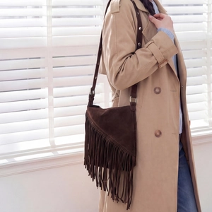Fashionable dark brown suede crossbody bag with long tassels and shoulder strap for women