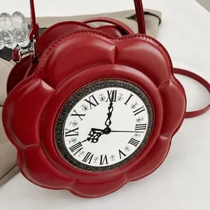 Close-up of red petal-shaped clock bag with Roman numerals and leather strap