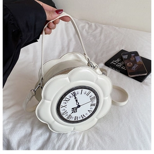 Detailed view of white flower-shaped clock handbag with vintage Roman numerals and PU leather