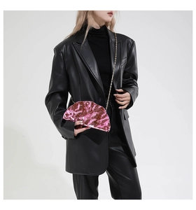 Acrylic seashell clutch with pink marble ice crack texture and golden chain strap