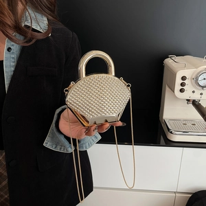 Sparkling champagne gold rhinestone evening clutch bag with round metal handle and chain strap