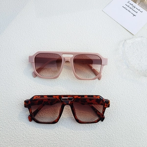 Modern double bridge square sunglasses in nude pink and leopard print finishes