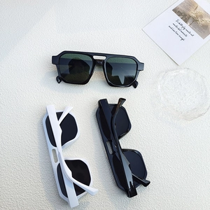 Detail view of stylish punk sunglasses with double bridge and geometric polygon frames