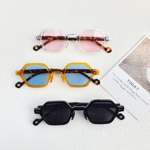 Three pairs of irregular hexagonal sunglasses in pink, blue, and black frame options
