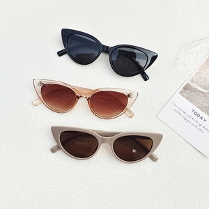 Three pairs of retro cat-eye sunglasses in black, tea brown, and beige colors