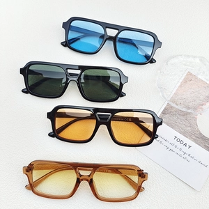 Stylish double-bridge rectangular sunglasses in assorted lens colors with ice cube props