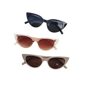 Retro cat-eye sunglasses set in black, tawny, and beige frames for women's stylish sun protection