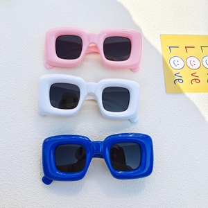 Chunky square sunglasses in pink white and blue colors with black UV lenses