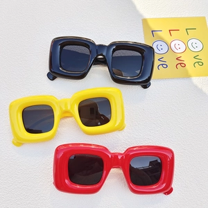 Three pairs of thick frame square sunglasses in black yellow and red colors