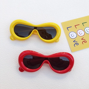 Chunky round oversized sunglasses for kids in bright yellow and red colors