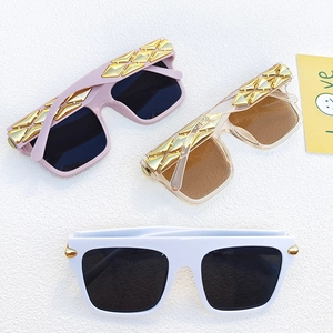Classic oversized sunglasses with gold metal rivets in pink, champagne, and white frames