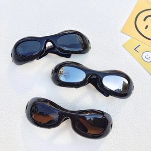 Retro oval sunglasses in black, silver, and tea tints with UV protection