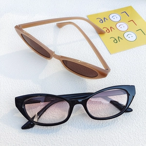 Detailed top view of retro cat-eye sunglasses with gradient lenses and stylish frames