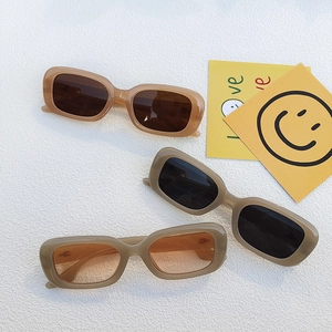 Three retro rectangle frame sunglasses in amber and olive green colors for beach and driving