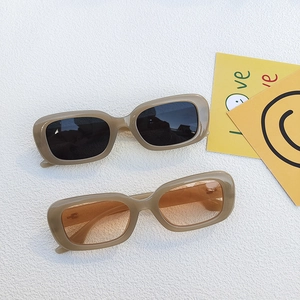 Retro rectangle sunglasses for men and women with beige frames and tinted lenses
