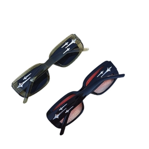 Y2K vintage rectangle sunglasses with silver star metal detailing and UV protection lenses