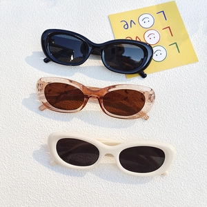 Retro oval cat-eye sunglasses for women and men in black, brown and cream colors