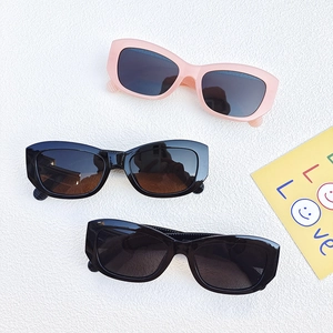 Three pairs of stylish cat-eye rectangular sunglasses in pink and black for women
