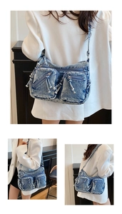 Détail du sac bandoulière en denim bleu délavé avec plusieurs poches zippées et style urbain