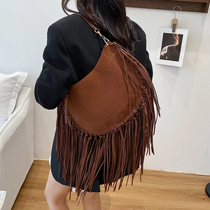 Vintage braune Wildleder-Fransentasche mit böhmischen langen Quasten und Trageriemen