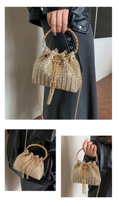 Detailed view of rhinestone bucket bag featuring gold tassels and drawstring closure