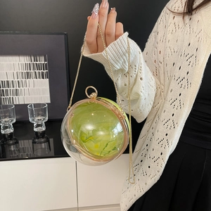 Spherical acrylic evening clutch with green marble texture and gold chain strap