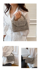 Detailed views of a silver beaded hollow out handbag with a metal chain shoulder strap