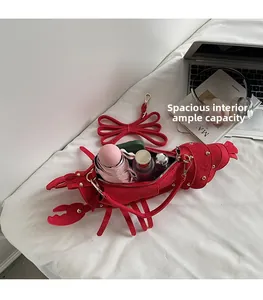 Spacious interior of red lobster crossbody bag showing large storage for daily essentials