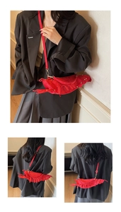 Detailed views of the red lobster-shaped crossbody bag with soft suede texture