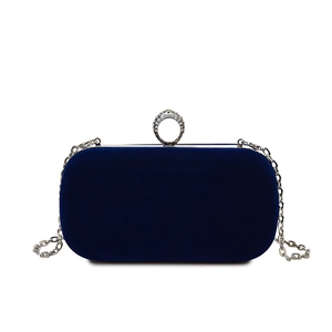 Elegant navy blue velvet evening clutch with sparkling silver ring clasp and chain strap