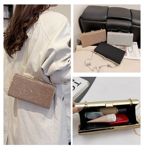 Detailed view of rhinestone evening clutch colors and internal storage capacity