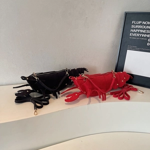 Creative lobster shaped matte suede shoulder bags in red and black with metallic rivets