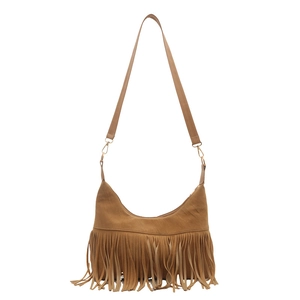 Bohemian suede tassel crossbody bag with adjustable strap and crescent shape design