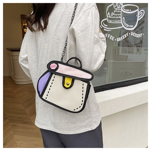 Detailed close-up of 2D cartoon style crossbody bag featuring vibrant color blocking