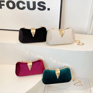 Retro velvet evening clutches with leaf buckles in black, cream, red and green colors