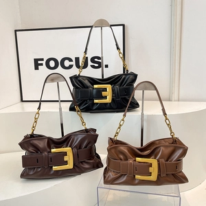 Chic pleated cloud underarm bags in black and brown with oversized gold metal buckles