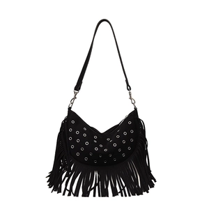 Vintage black suede fringe crossbody bag with metal rings and bohemian tassel design