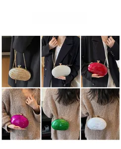 Collage of chic acrylic evening bags in six colors with gold chains and marble texture