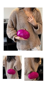 Detailed views of a marble texture magenta acrylic evening bag with gold chain strap