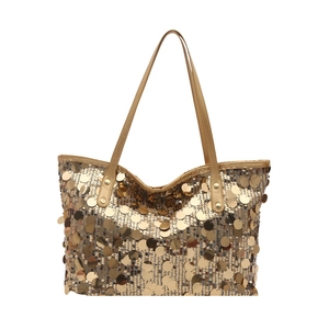 Sac fourre-tout à paillettes dorées avec bandoulières en similicuir sur fond blanc