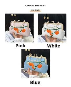 Detailed color display of embroidered handbags in pink, white, and blue with metal clasp