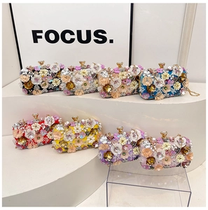 Close-up of floral evening bags in 8 vibrant colors with sequins and 3D petal textures