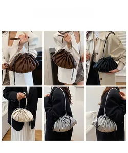 Collage of pleated dumpling bags in brown, black, beige, and silver being worn as shoulder bags