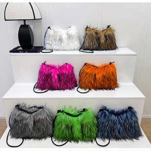 Detail view of colorful faux fur crossbody bags in seven vibrant fluffy shades
