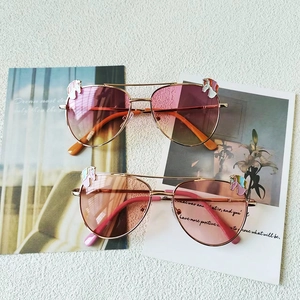 Lunettes aviateur enfant monture dorée, détails licorne et verres dégradés colorés