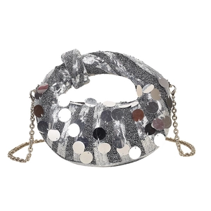 Chic silver sequin dumpling bag with unique knot handle and metallic chain strap