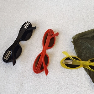 Kids vintage oval sunglasses in black, red and yellow with UV protection and metal trim